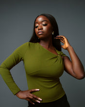 Load image into Gallery viewer, Green asymmetric sleeve top with gold clasp detail
