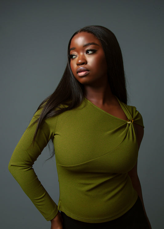 Green asymmetric sleeve top with gold clasp detail