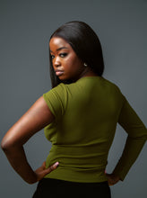 Load image into Gallery viewer, Green asymmetric sleeve top with gold clasp detail
