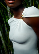 Load image into Gallery viewer, White asymmetric sleeve top with gold clasp detail
